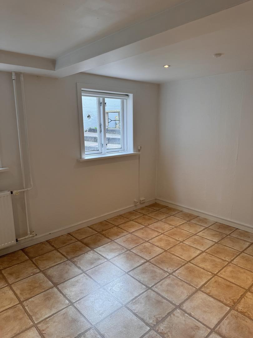 Kjallara íbuð mitt í Torshavn