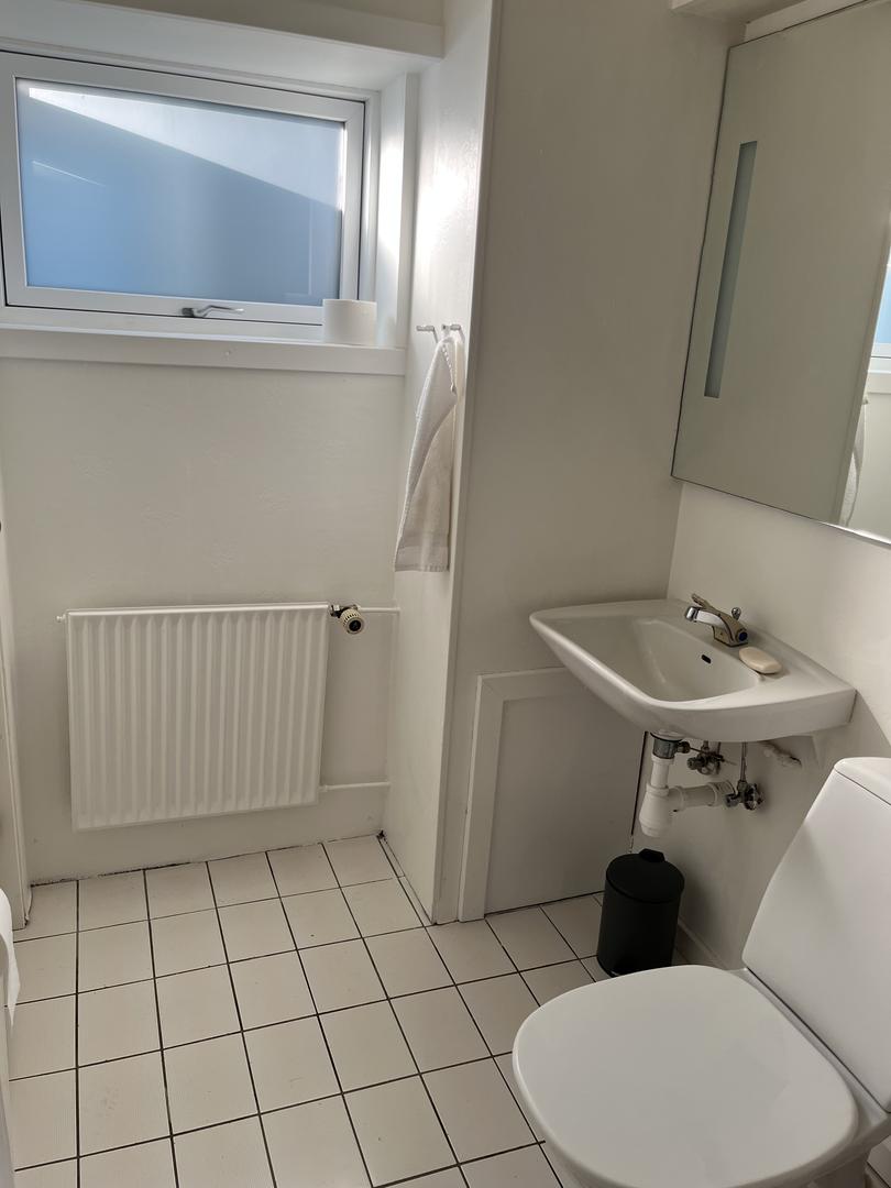 Kjallaraíbúð mitt í Havn